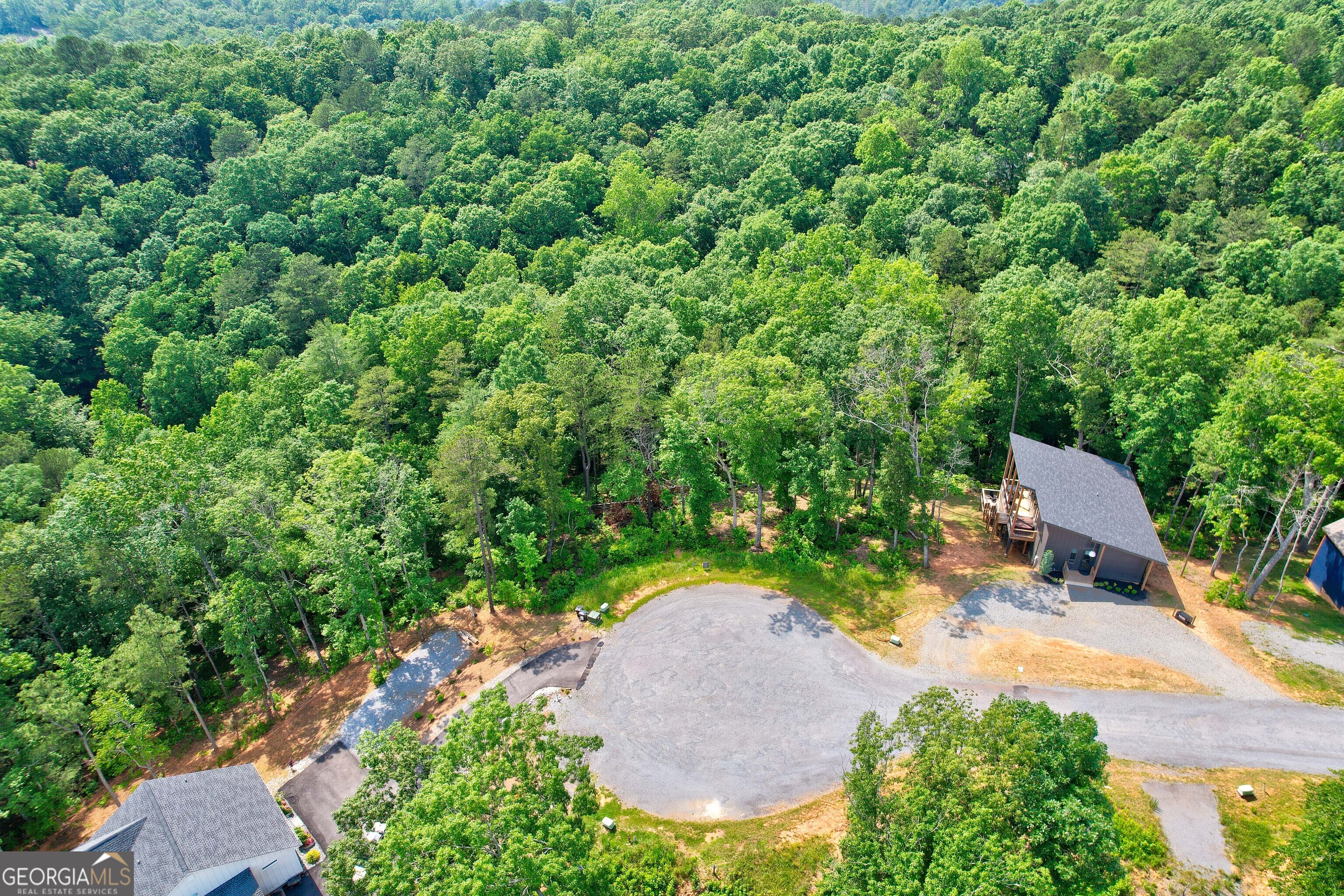 Lot 16 Lake Top Lane Ellijay, GA 30540 - Photo 10 of 17 an aerial view of a house with a yard and lake view
