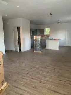a view of a kitchen with a sink