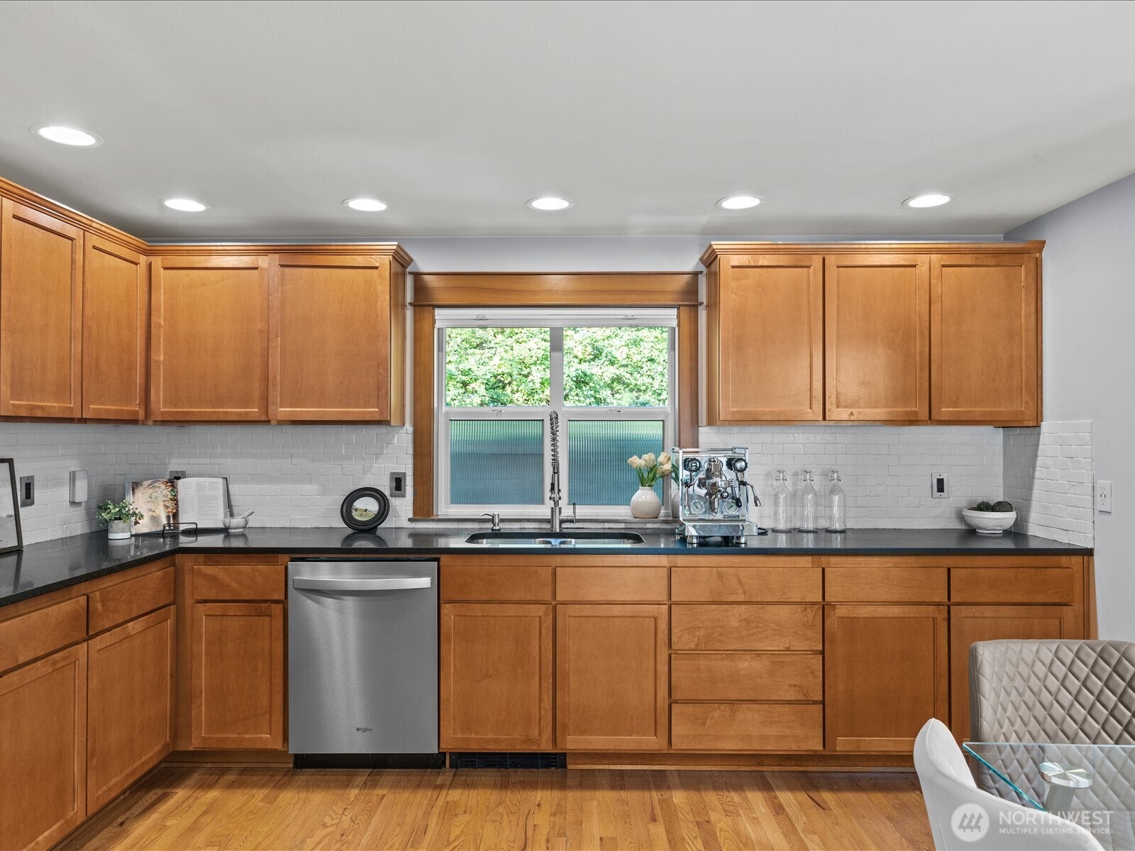 3018 Southwest Hinds Street Seattle, WA 98126 - Photo 13 of 27 a kitchen with a sink and cabinets
