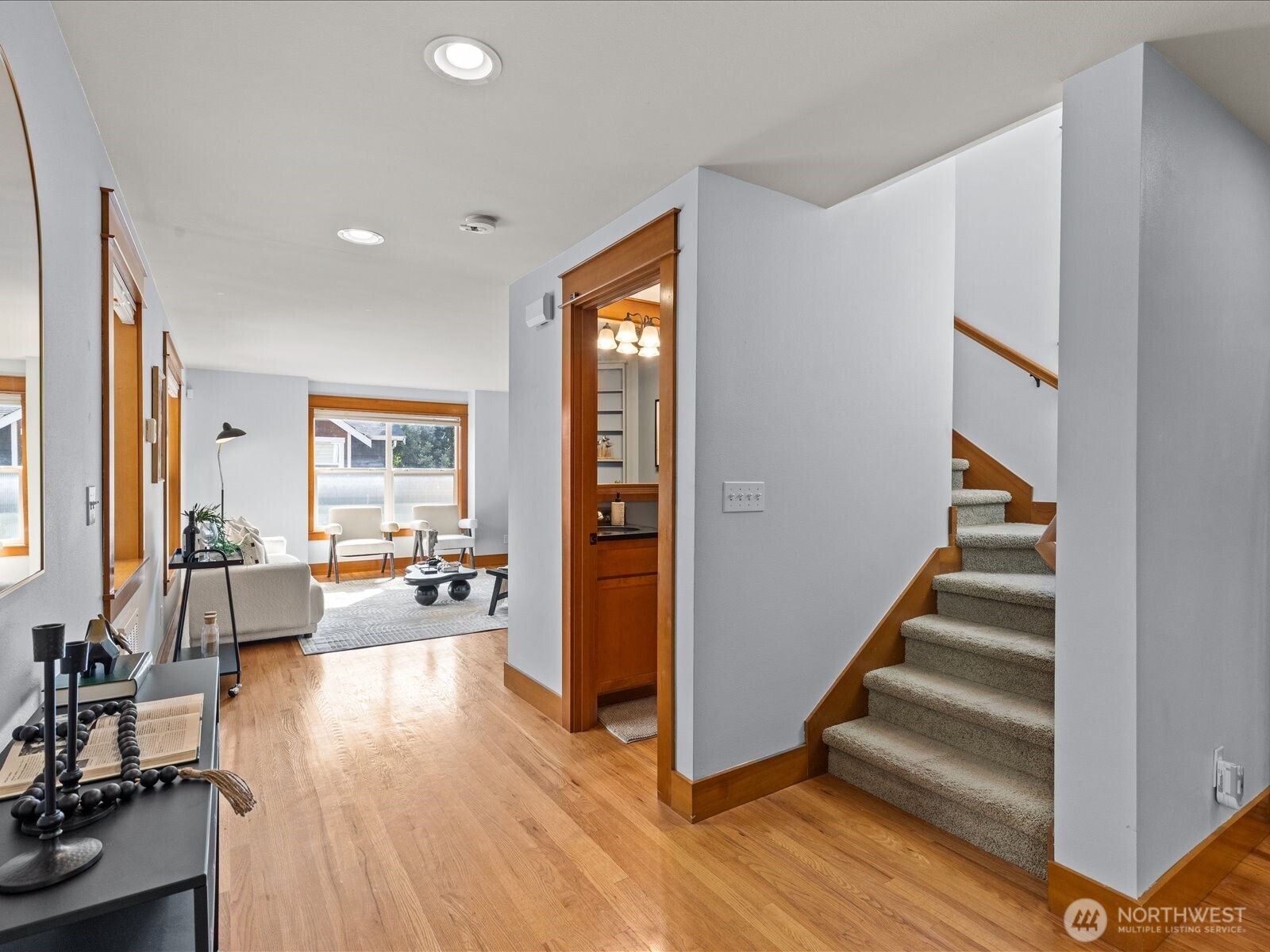 3018 Southwest Hinds Street Seattle, WA 98126 - Photo 15 of 27 a view of a livingroom with wooden floor and furniture