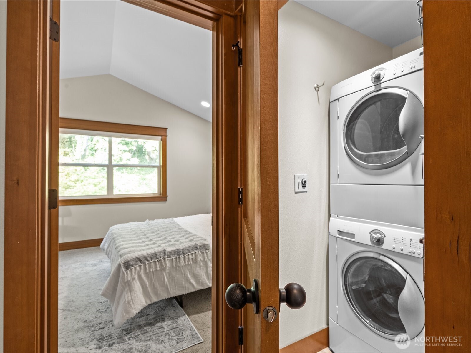 3018 Southwest Hinds Street Seattle, WA 98126 - Photo 24 of 27 a bedroom with a bed and a view of bedroom