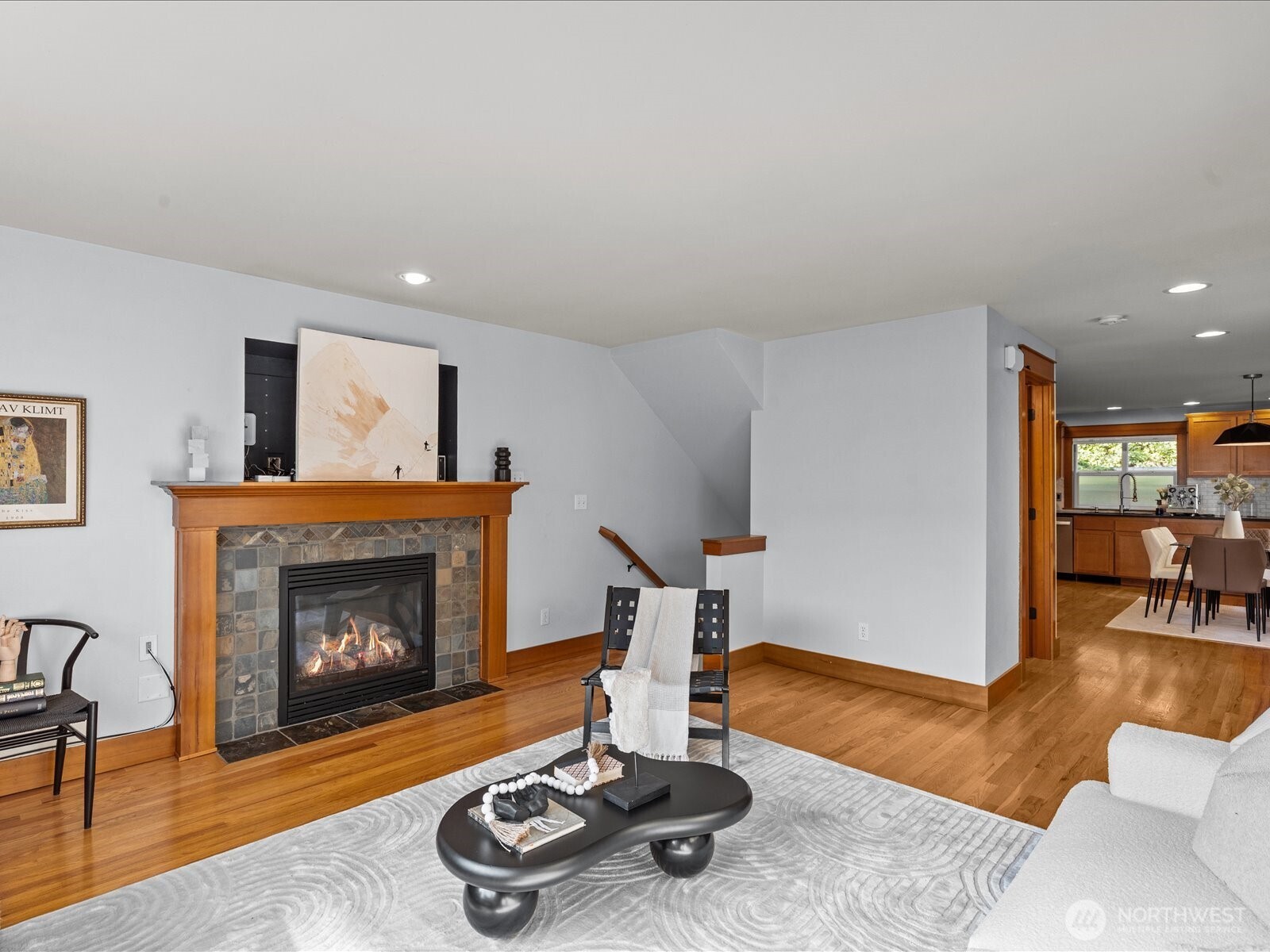 3018 Southwest Hinds Street Seattle, WA 98126 - Photo 6 of 27 a living room with furniture and a fireplace