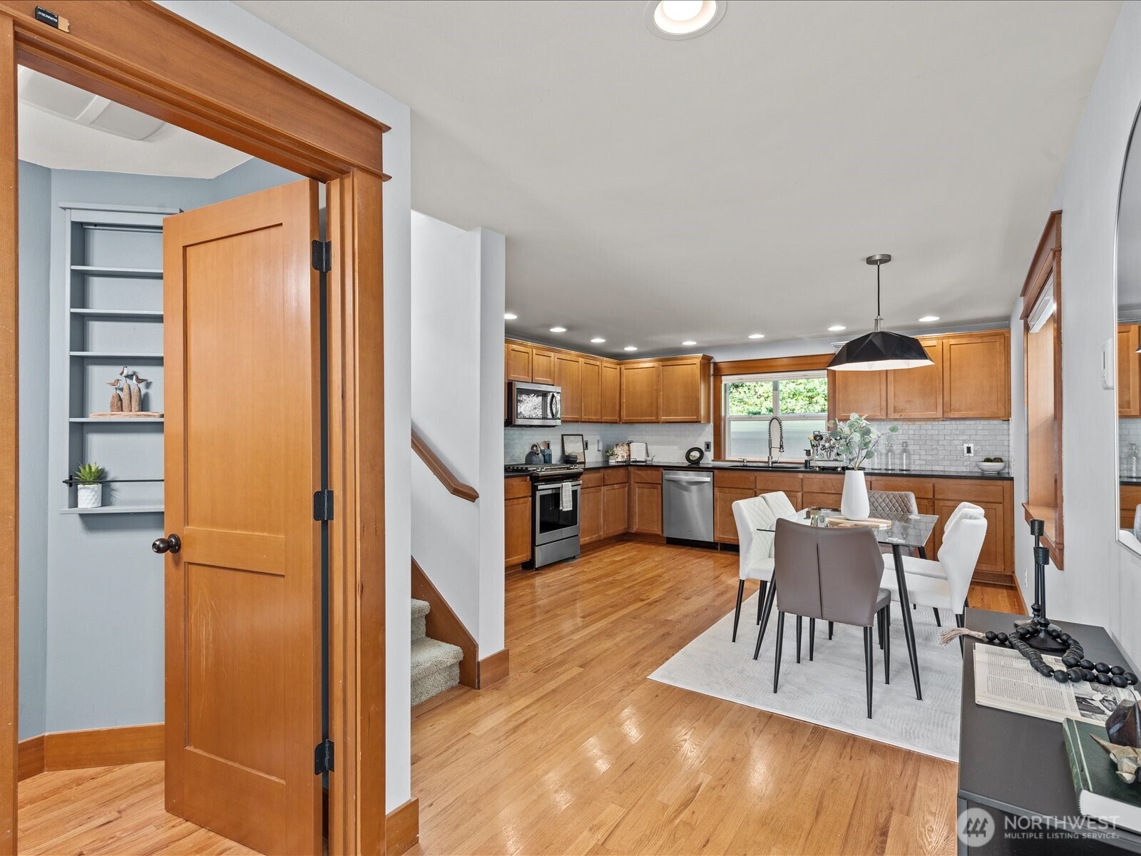 3018 Southwest Hinds Street Seattle, WA 98126 - Photo 8 of 27 a view of a livingroom with furniture and a floor to ceiling window