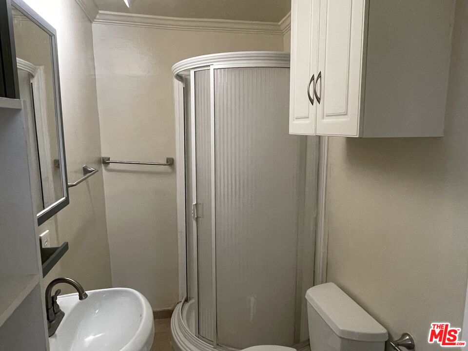 351 Temple Avenue, Unit E Long Beach, CA 90814 - Photo 12 of 22 a bathroom with a toilet and a sink