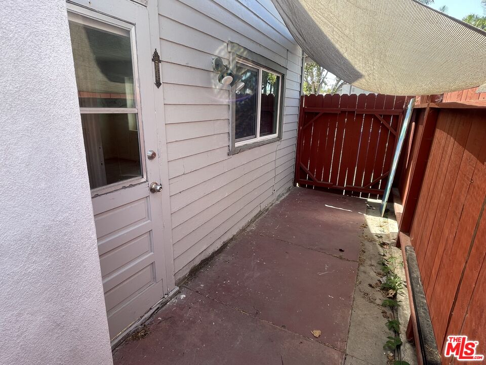 351 Temple Avenue, Unit E Long Beach, CA 90814 - Photo 18 of 22 a view of a house with a door