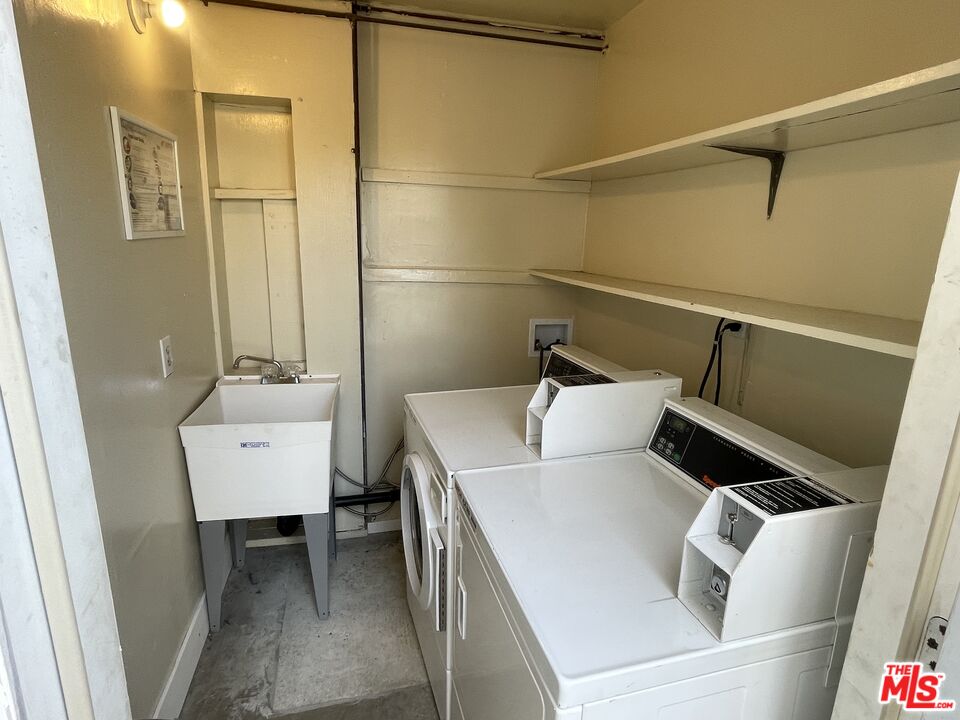 351 Temple Avenue, Unit E Long Beach, CA 90814 - Photo 22 of 22 a utility room with dryer and washer