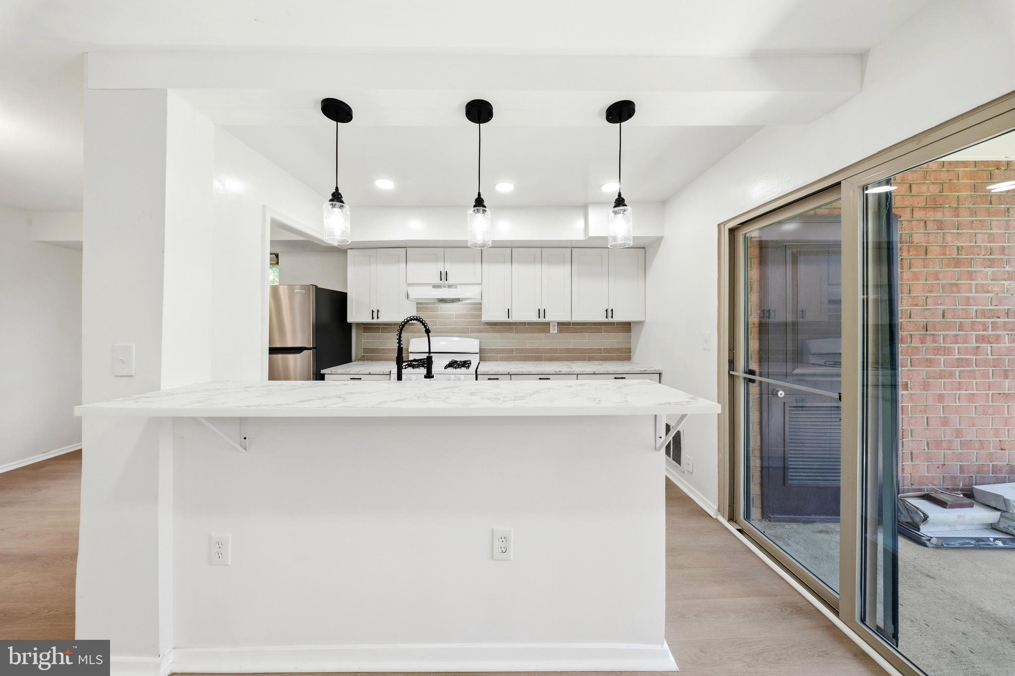 2202 Greenery Lane, Unit 30122 Silver Spring, MD 20906 - Photo 7 of 33 Kitchen Island