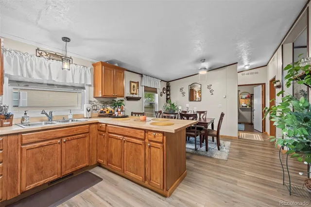 a kitchen with lots of counter top space and dining table