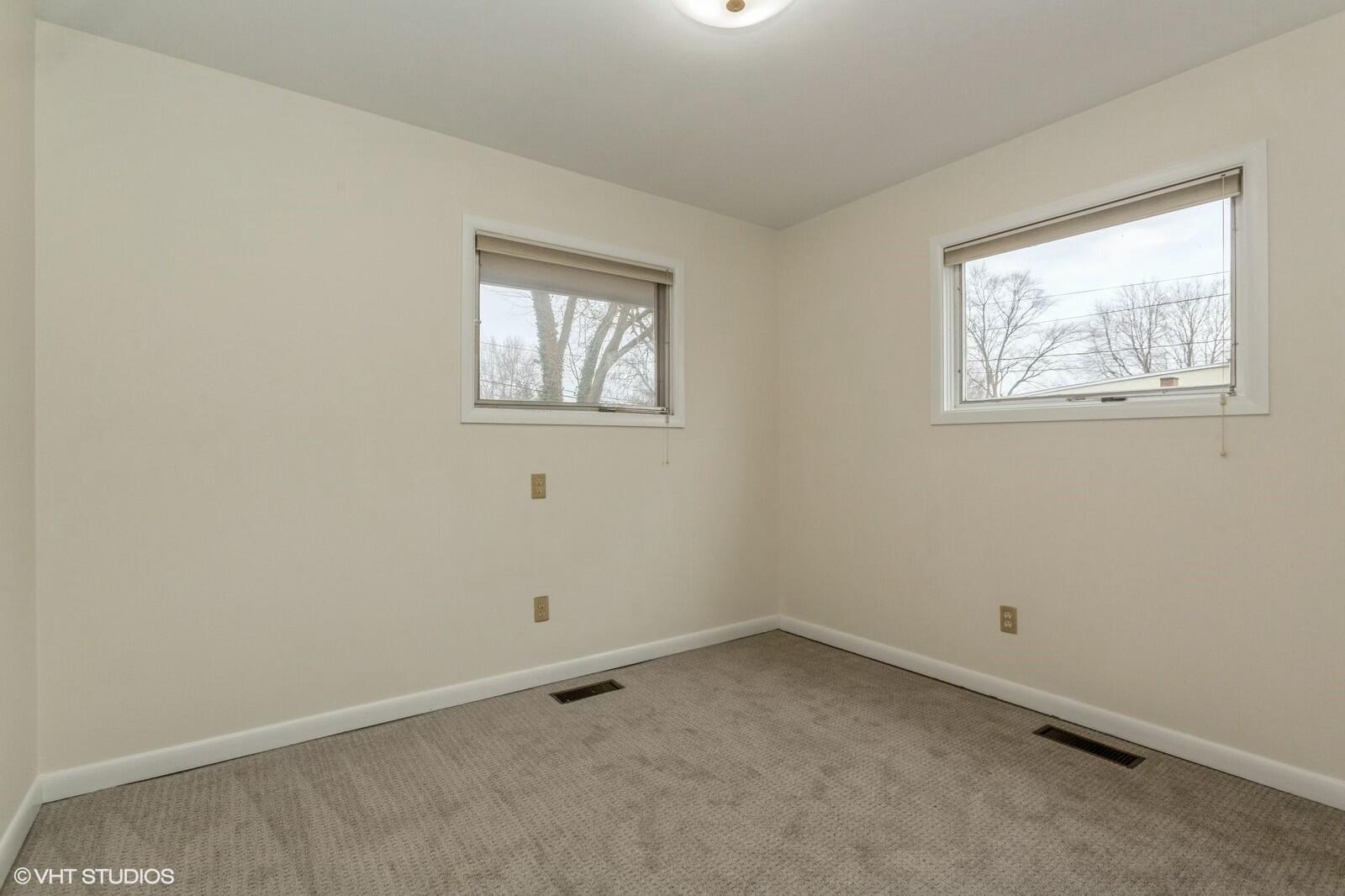 121 Belmont Court Michigan City, IN 46360 - Photo 11 of 12 an empty room with a window