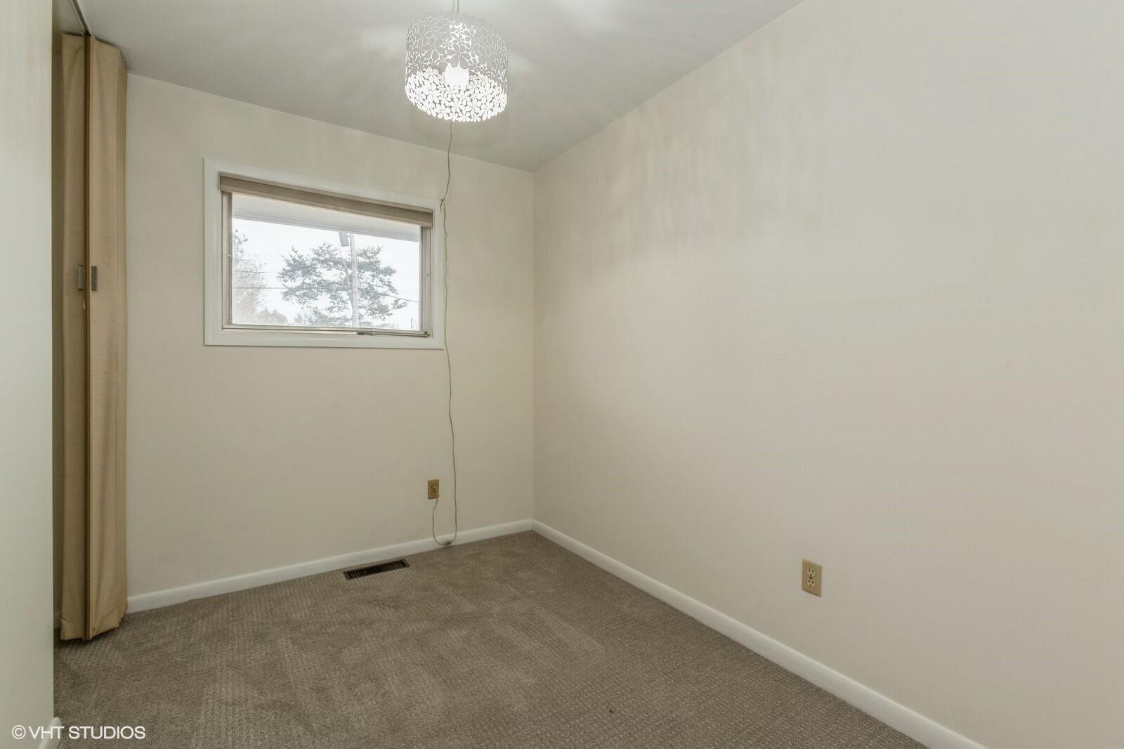 121 Belmont Court Michigan City, IN 46360 - Photo 12 of 12 an empty room with a window