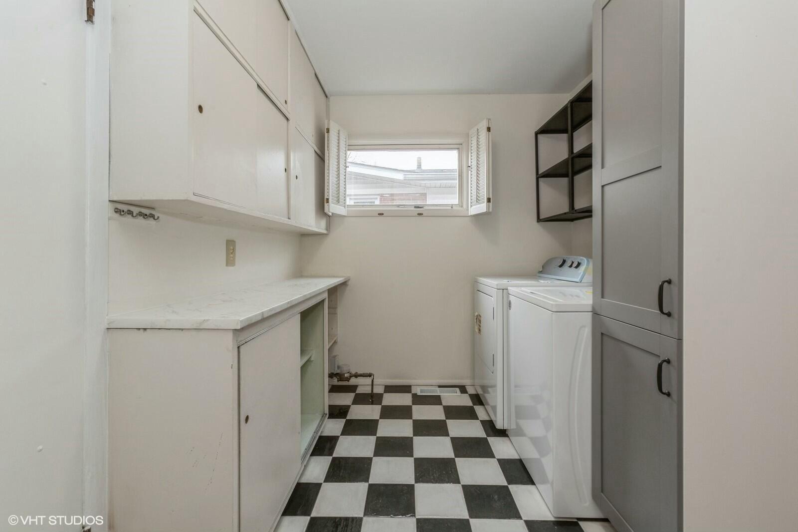 121 Belmont Court Michigan City, IN 46360 - Photo 7 of 12 a bathroom with a sink a toilet a window and a mirror