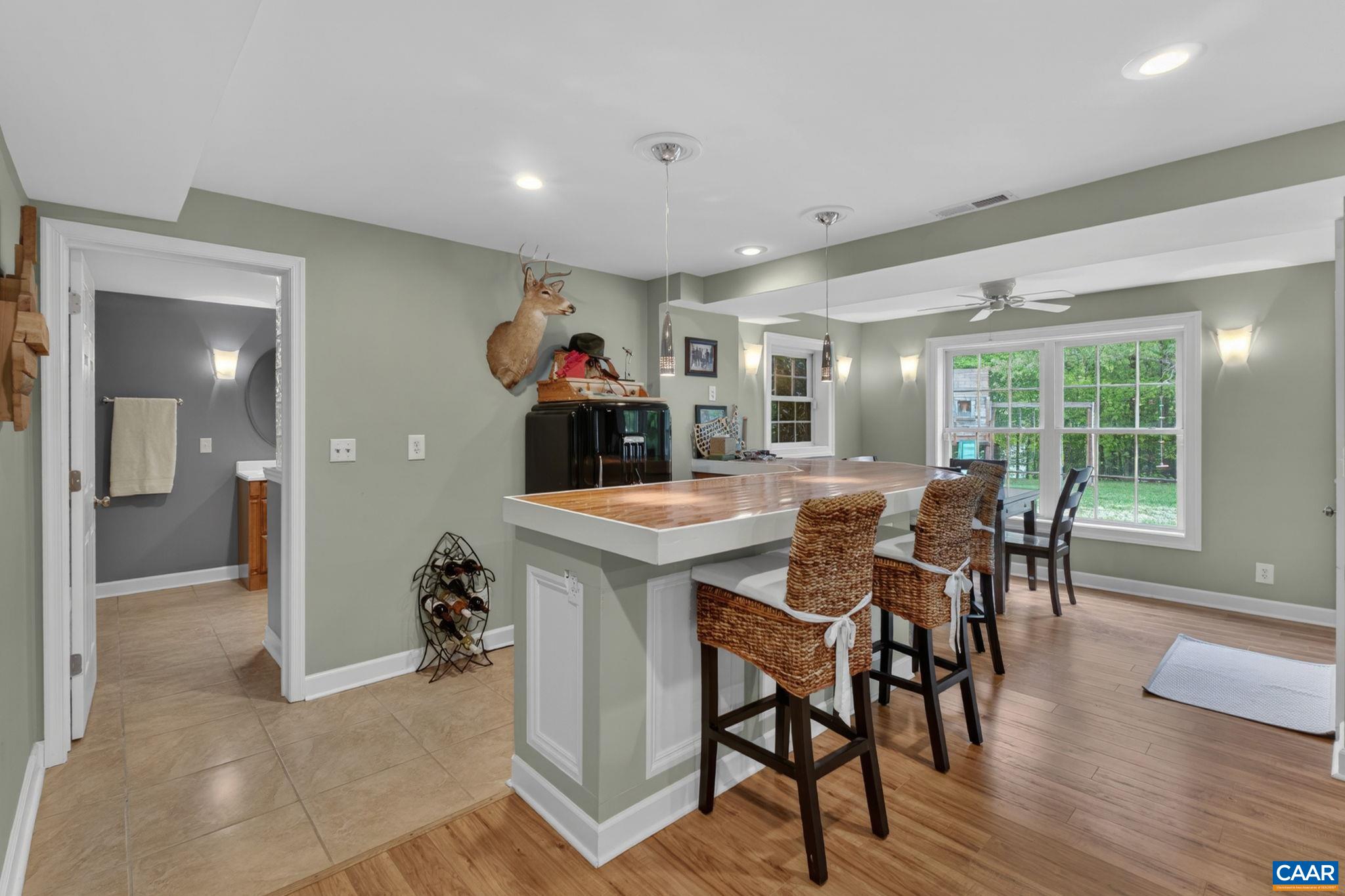 511 Taylor Ridge Way Palmyra, VA 22963 - Photo 38 of 57 a view of a dining room with furniture and wooden floor