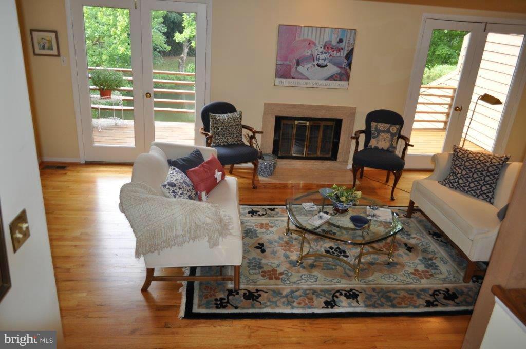 5565 Suffield Court Columbia, MD 21044 - Photo 12 of 30 a living room with furniture and a fireplace