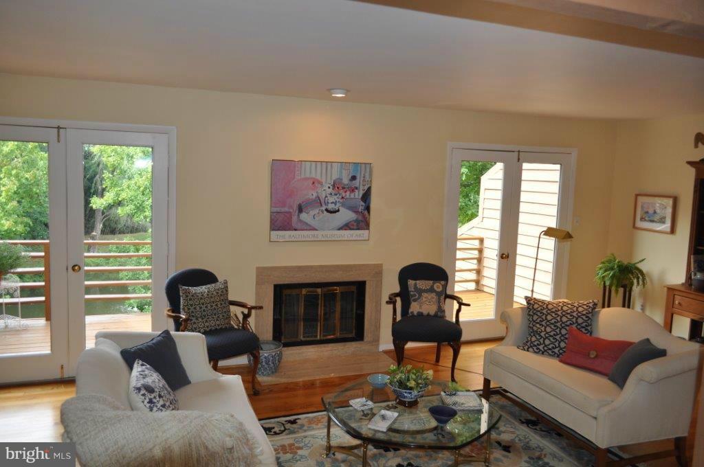 5565 Suffield Court Columbia, MD 21044 - Photo 13 of 30 a living room with furniture and a fireplace