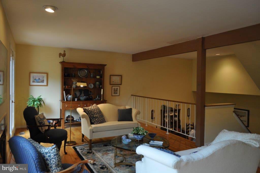 5565 Suffield Court Columbia, MD 21044 - Photo 14 of 30 a living room with furniture and a flat screen tv
