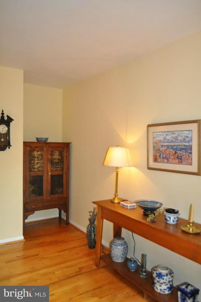 5565 Suffield Court Columbia, MD 21044 - Photo 15 of 30 a room with furniture and wooden floor