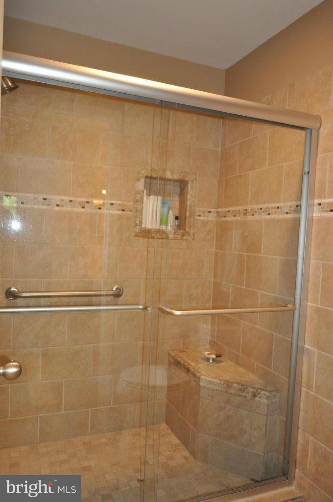 5565 Suffield Court Columbia, MD 21044 - Photo 24 of 30 a bathroom with a shower