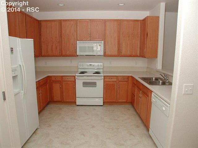 4011 Diamond Ridge View Colorado Springs, CO 80918 - Photo 9 of 17 A Different View of the Kitchen