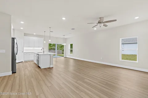 a kitchen with a stove and a microwave