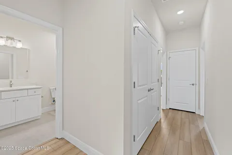 a view of a room with racks on the wall