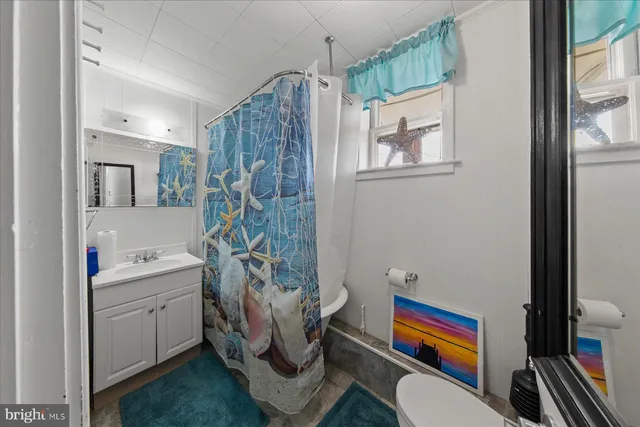 a view of bathroom with dual sinks