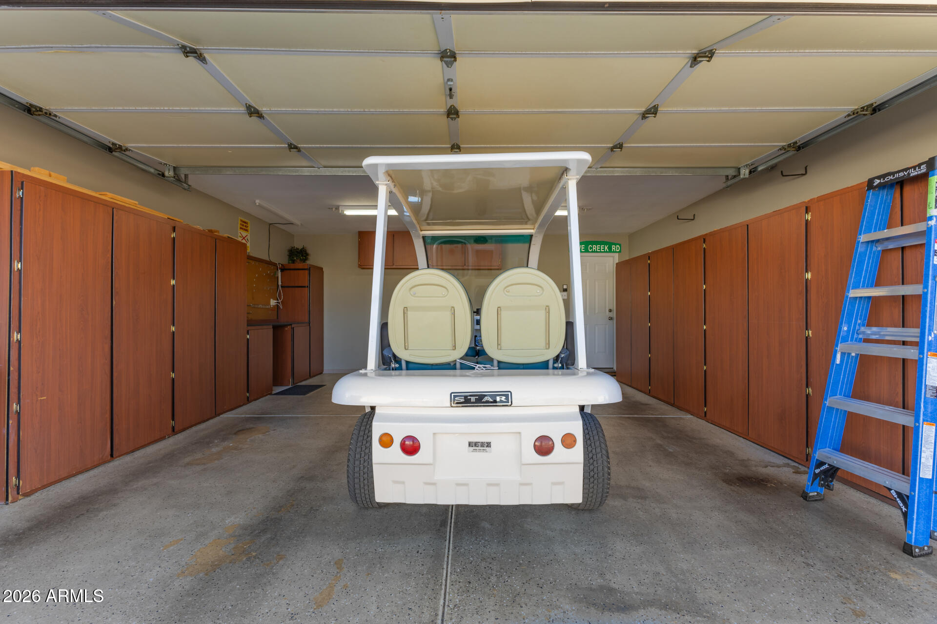 3301 South Goldfield Road, Unit 2056 Apache Junction, AZ 85119 - Photo 22 of 24 Garage