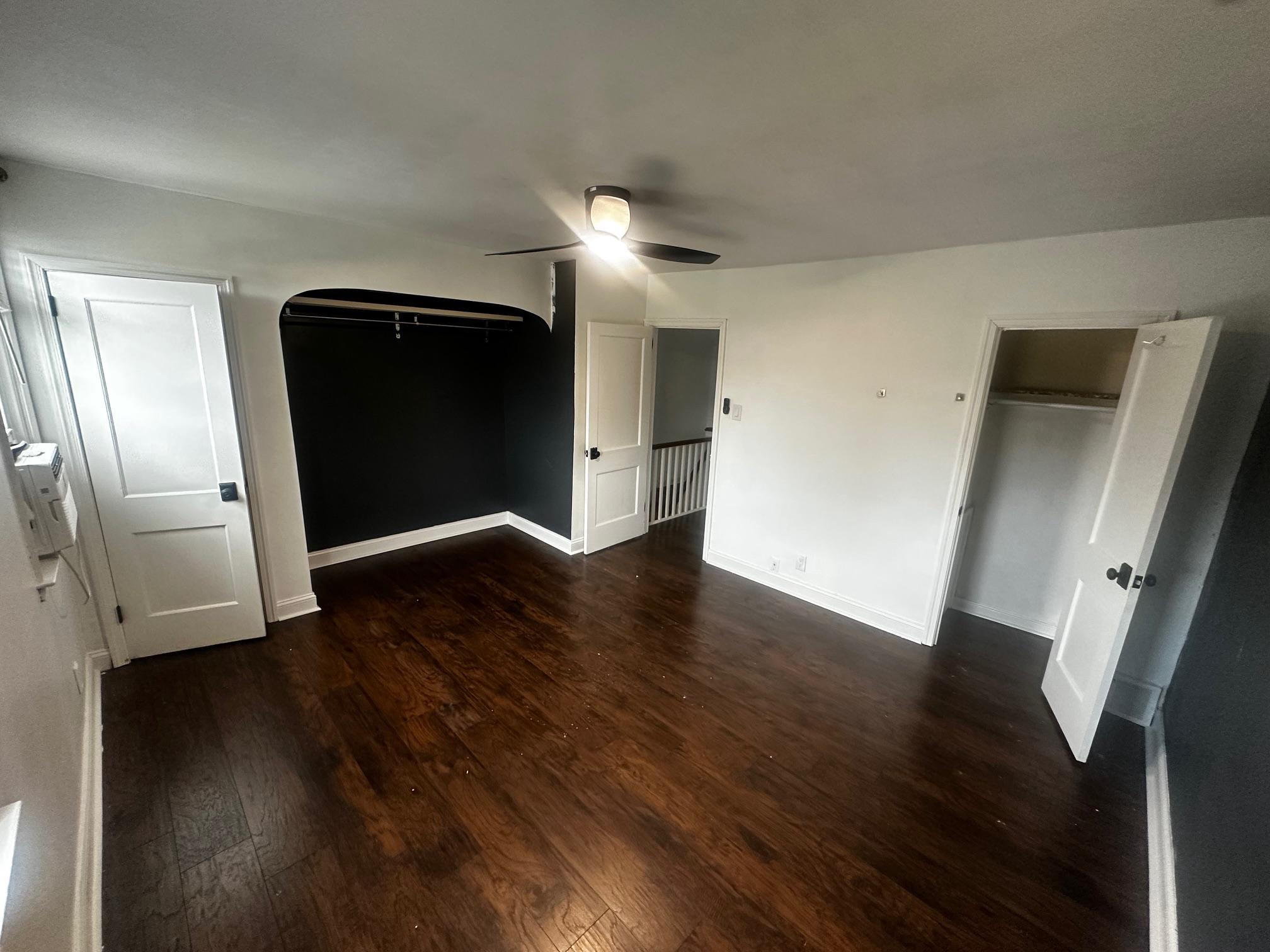 3050 Willits Road Philadelphia, PA 19136 - Photo 12 of 22 a view of an empty room with wooden floor and a ceiling fan