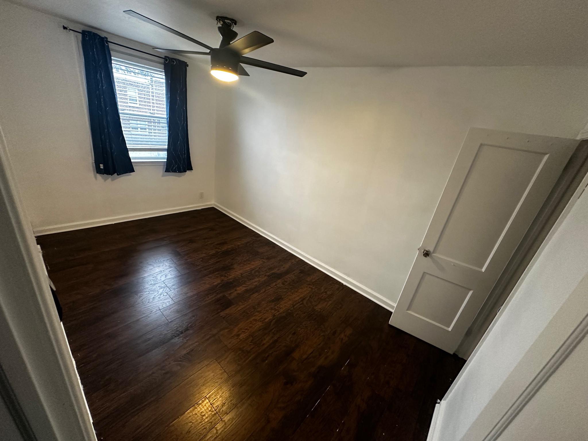 3050 Willits Road Philadelphia, PA 19136 - Photo 13 of 22 an empty room with wooden floor and windows