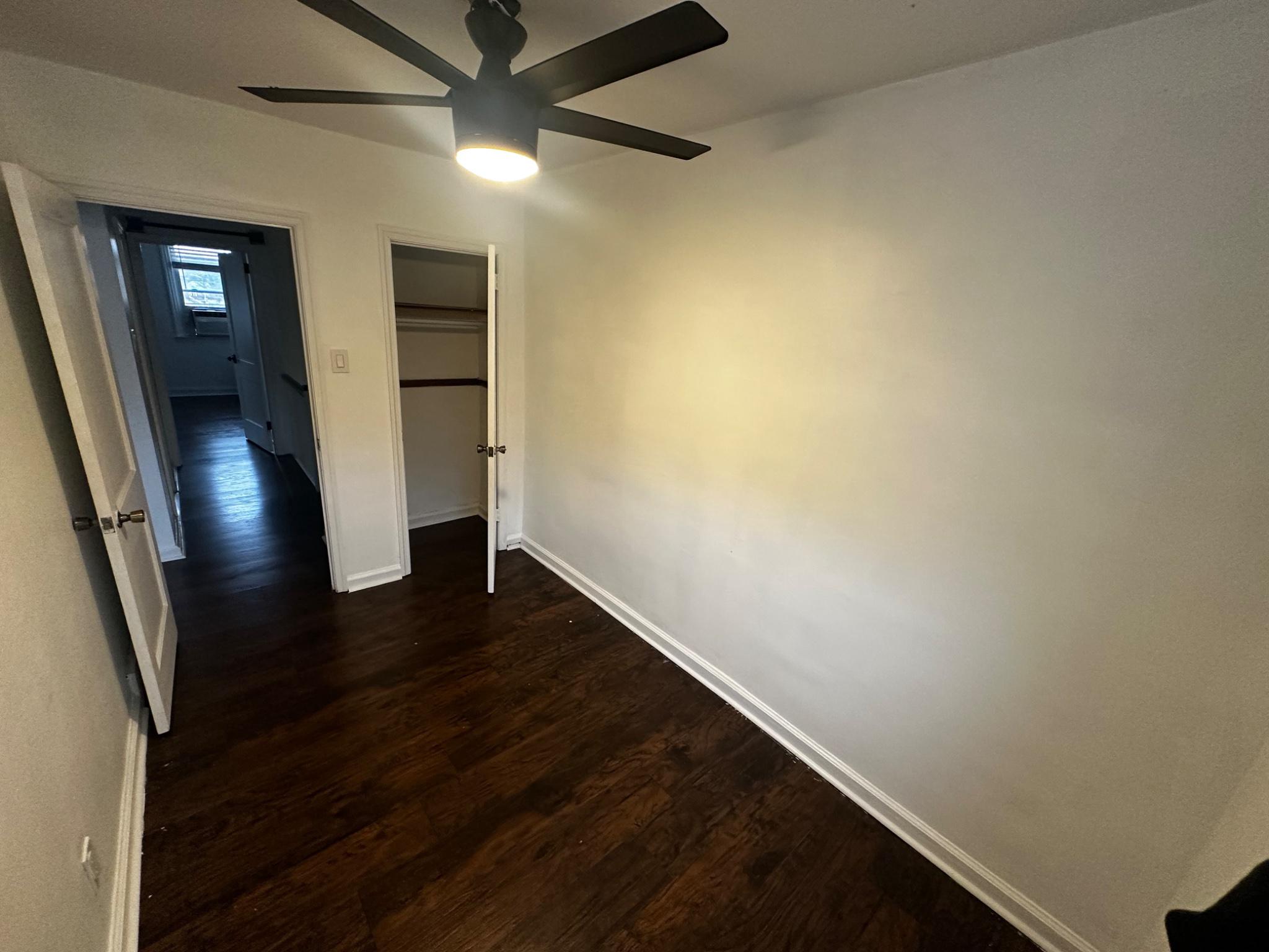 3050 Willits Road Philadelphia, PA 19136 - Photo 16 of 22 a view of an empty room with wooden floor and a window