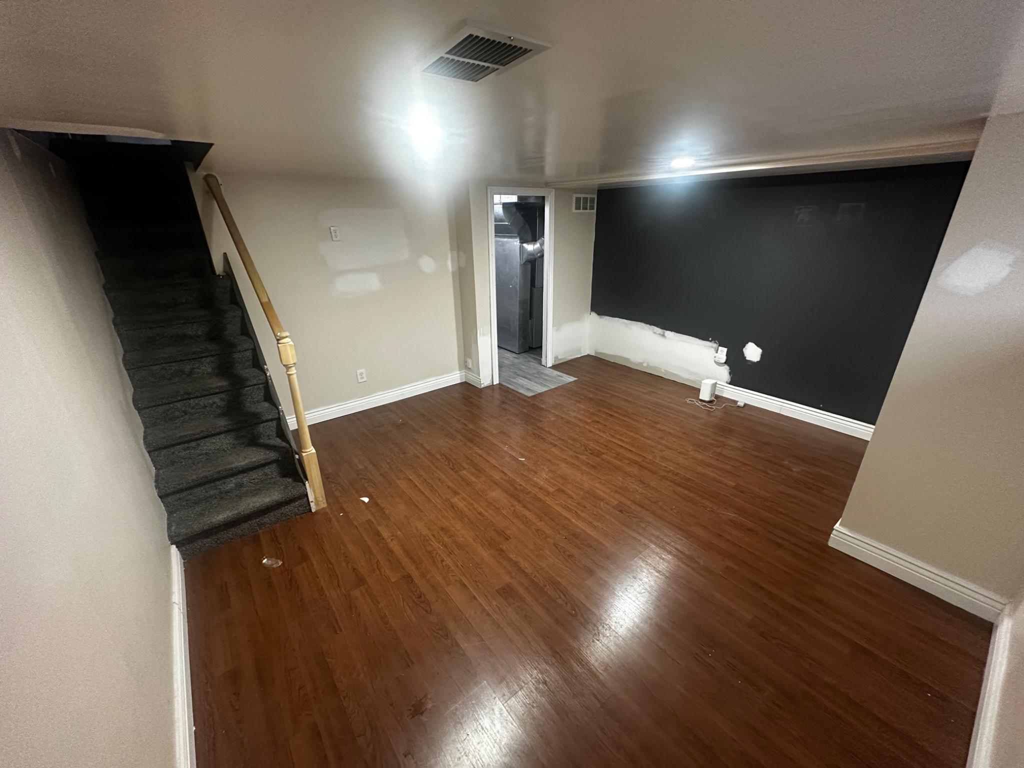 3050 Willits Road Philadelphia, PA 19136 - Photo 17 of 22 a view of an empty room with wooden floor