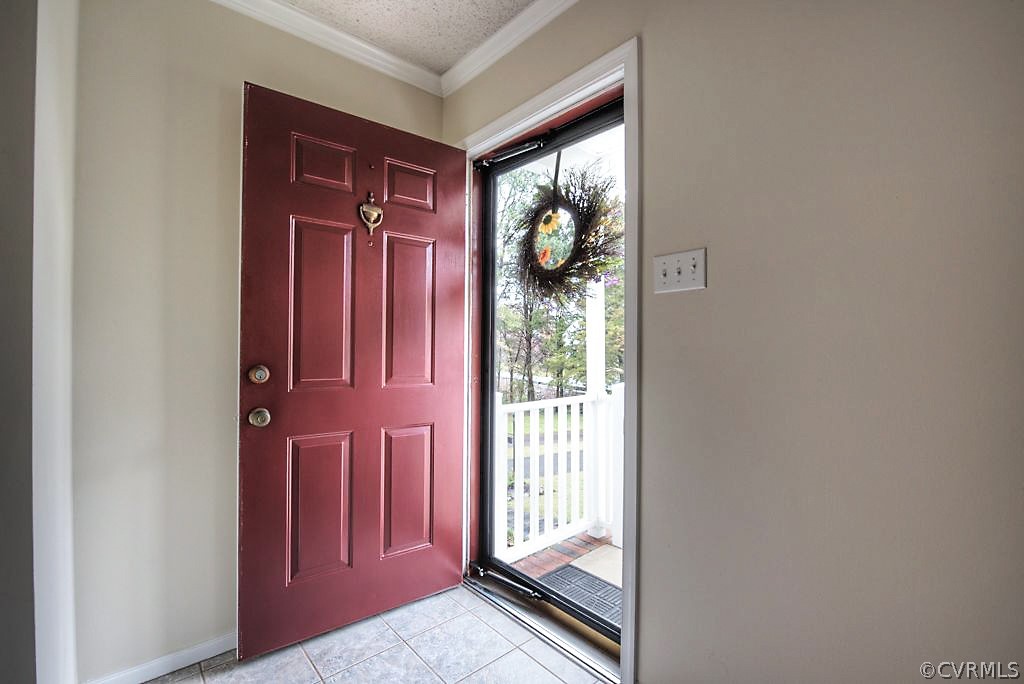 8306 Woodman Road Henrico, VA 23228 - Photo 6 of 48 Welcome Home! tile entry to living room