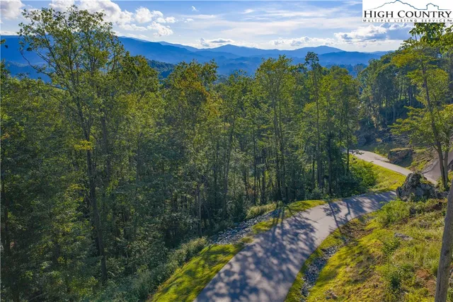 a view of a backyard of the house