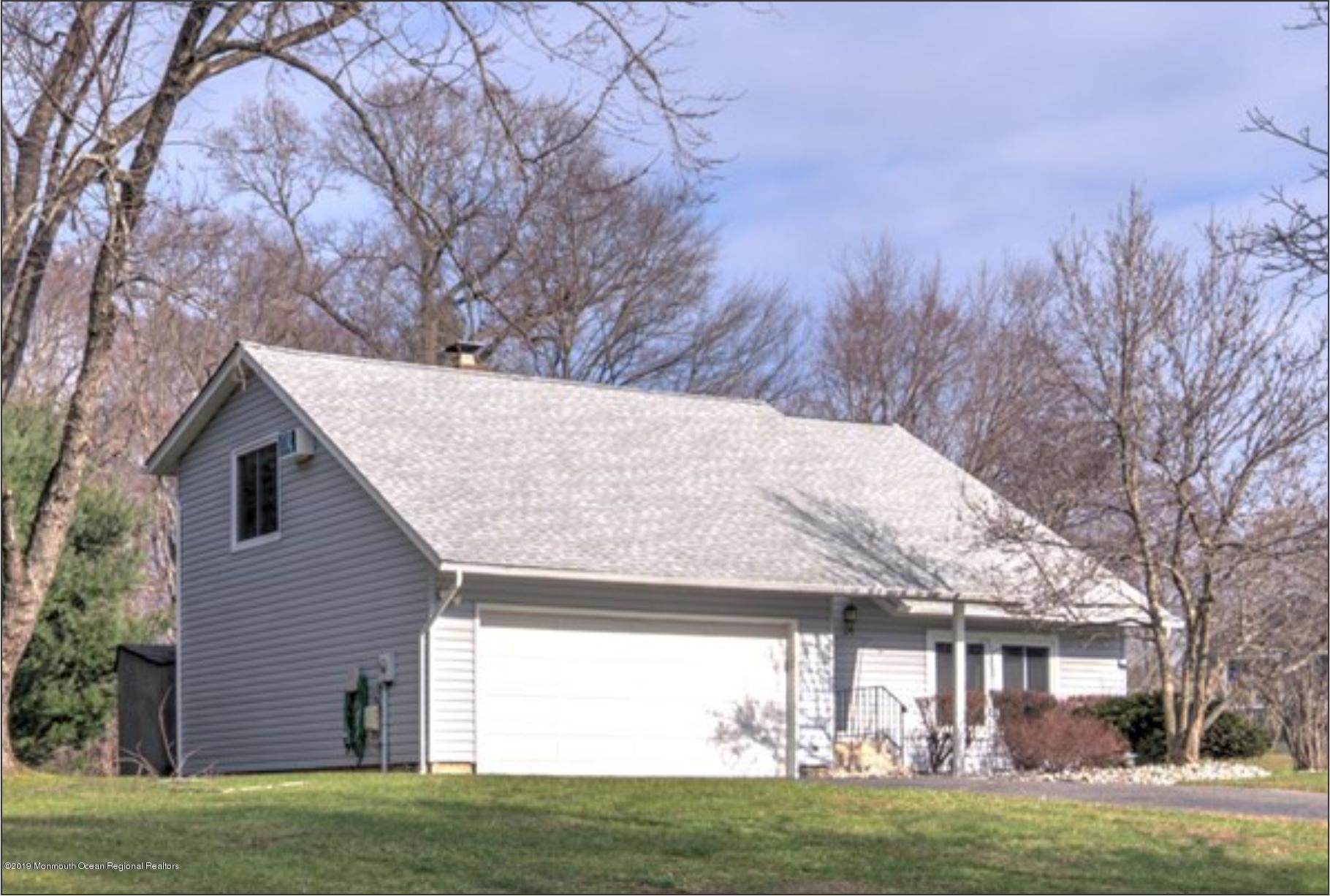 24 Valley Road Manalapan, NJ 07726 - Photo 1 of 30 a view of a house with a yard