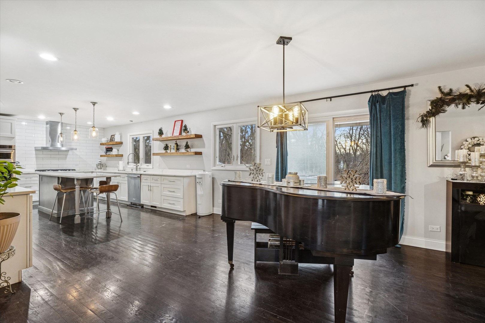 365 61st Street Willowbrook, IL 60527 - Photo 3 of 18 a living room with kitchen island furniture and a chandelier