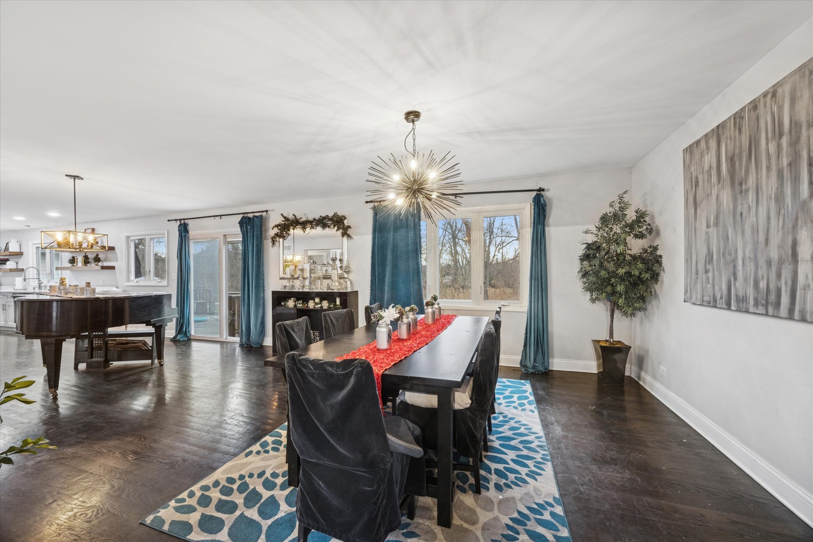 365 61st Street Willowbrook, IL 60527 - Photo 5 of 18 a living room with furniture a chandelier and a dining room