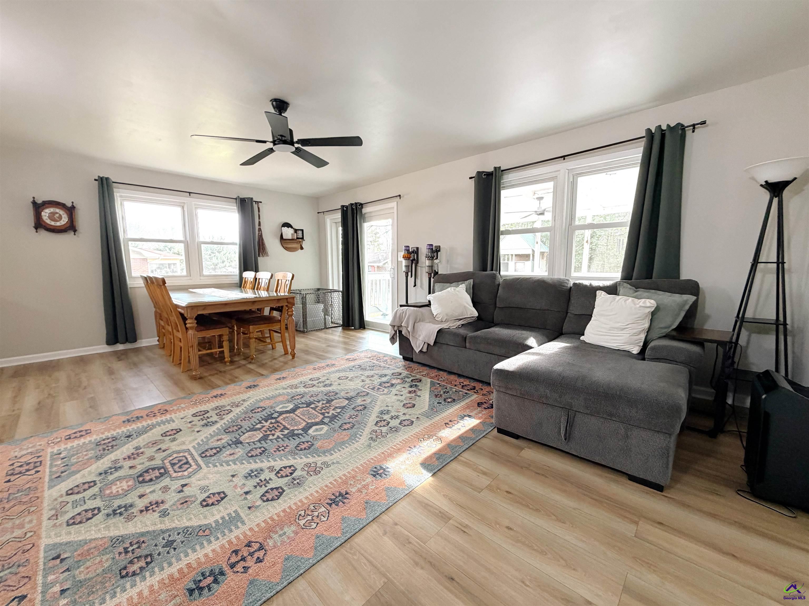 108 Weaver Road Warner Robins, GA 31093 - Photo 4 of 26 a living room with furniture and a large window