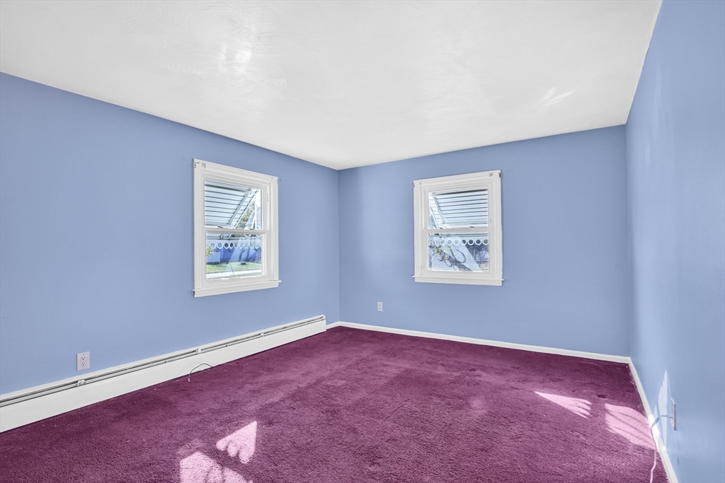 74 Valley Road Springfield, MA 01119 - Photo 18 of 23 a view of an empty room with a window