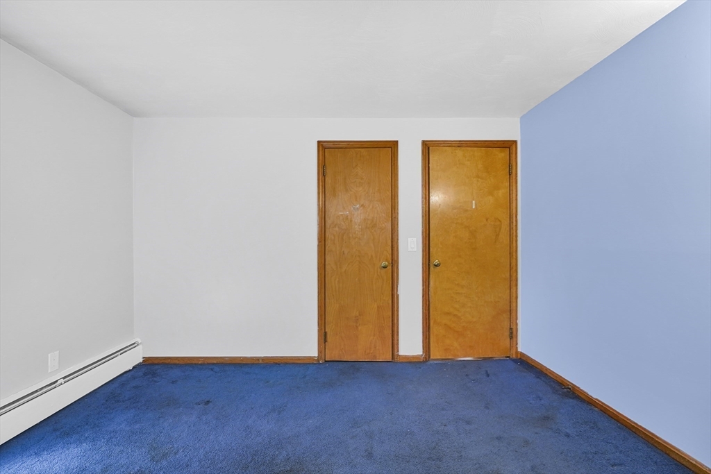 74 Valley Road Springfield, MA 01119 - Photo 20 of 23 a view of empty room with wooden floor