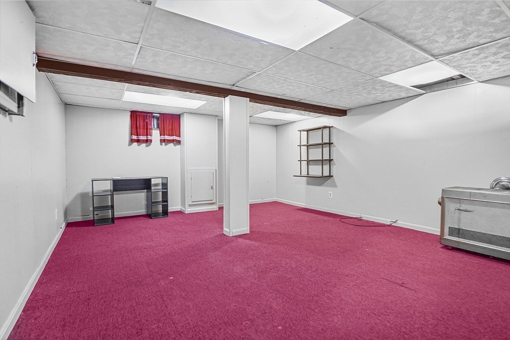 74 Valley Road Springfield, MA 01119 - Photo 21 of 23 a view of an empty room with a window