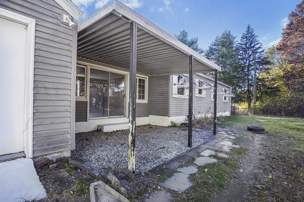 74 Valley Road Springfield, MA 01119 - Photo 3 of 23 a view of a house with a backyard