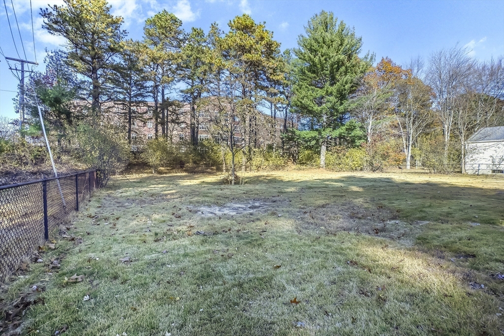 74 Valley Road Springfield, MA 01119 - Photo 5 of 23 a fire hydrant in the middle of a field