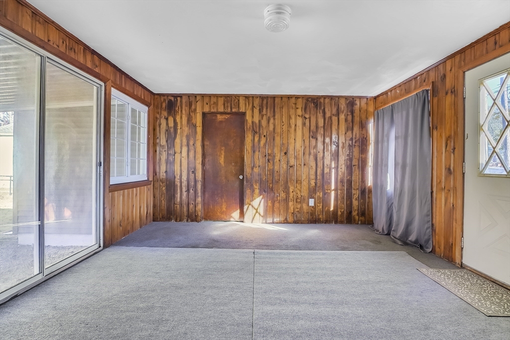 74 Valley Road Springfield, MA 01119 - Photo 7 of 23 a view of an empty room with a window