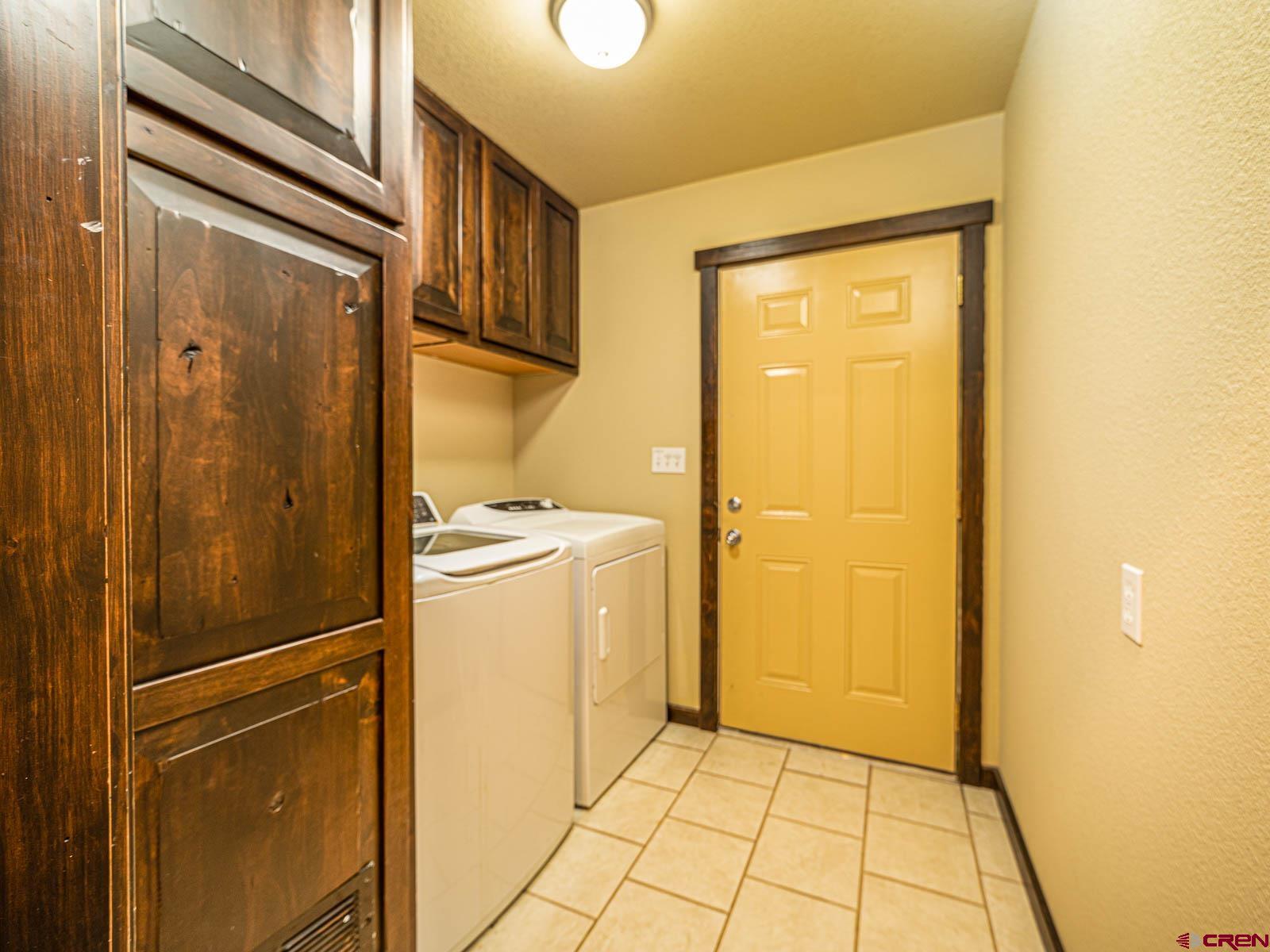 5085 3675th Road Crawford, CO 81415 - Photo 17 of 35 a view of a storage & utility room with a refrigerator