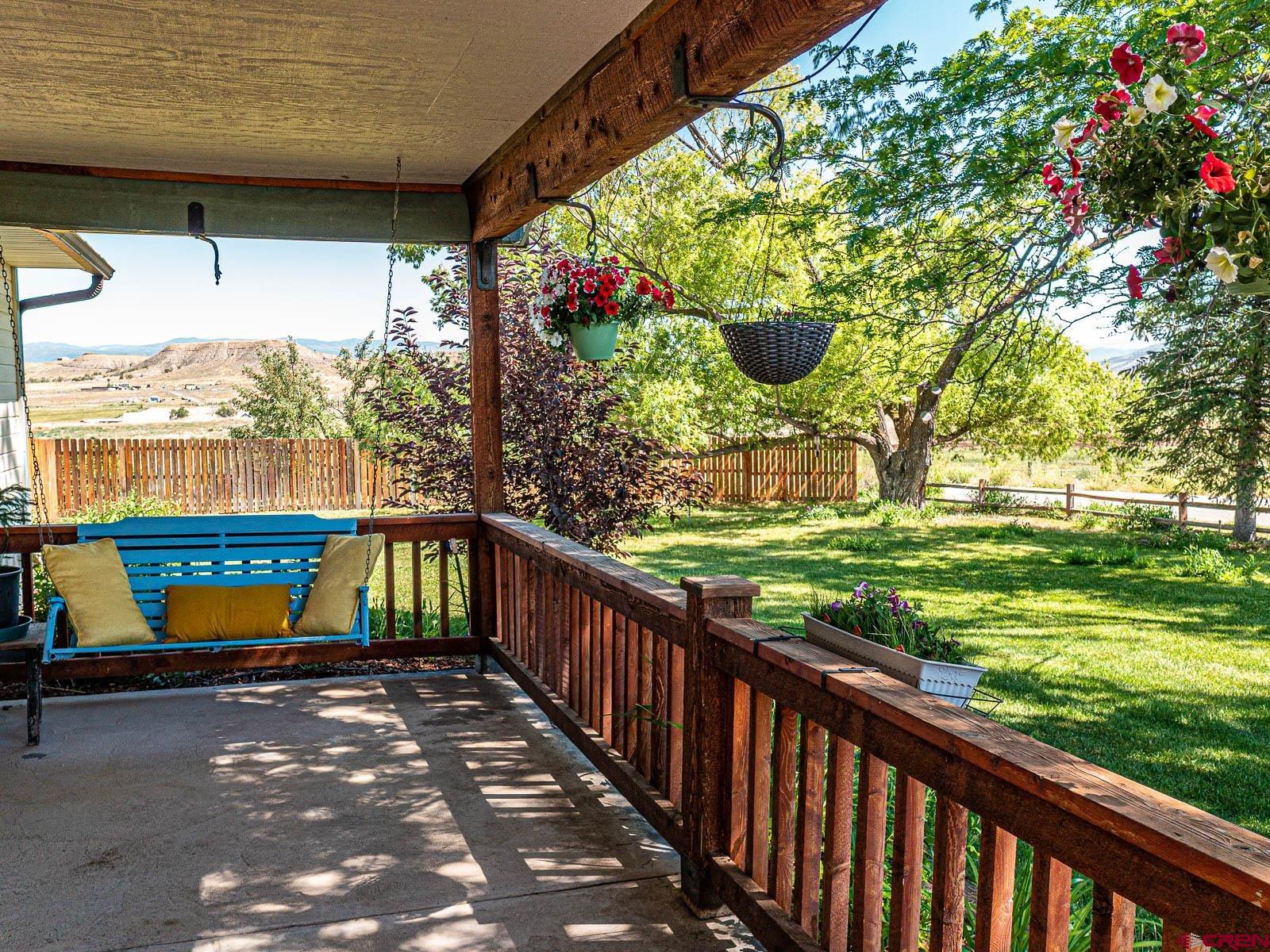 5085 3675th Road Crawford, CO 81415 - Photo 5 of 35 a view of two chairs in the balcony