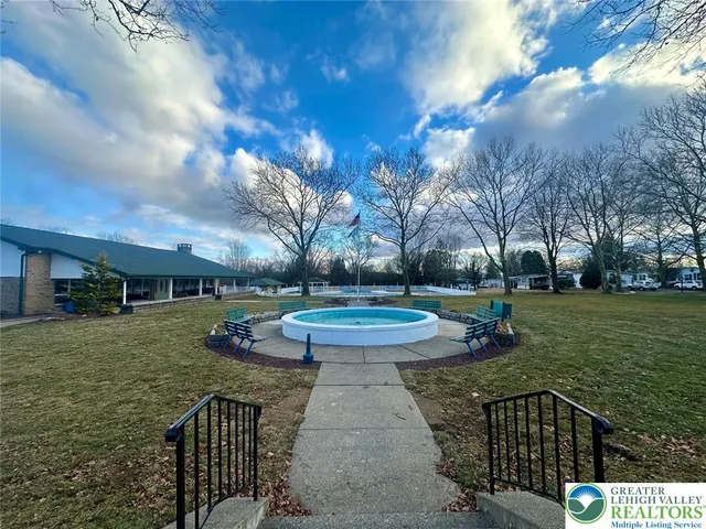 a view of a backyard with green space