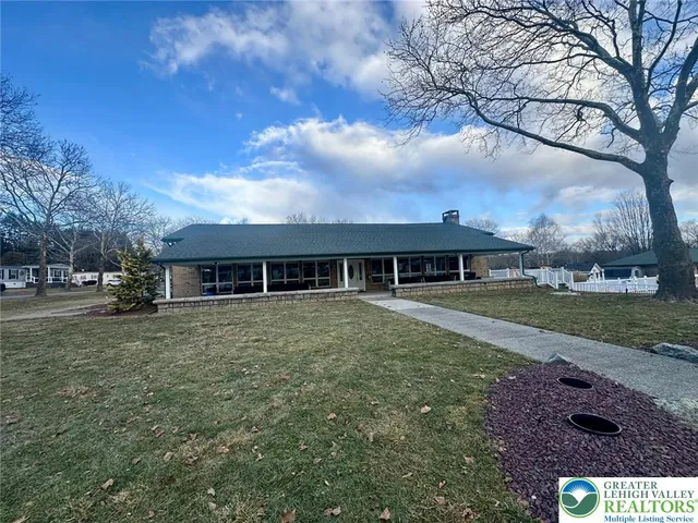 a view of house with outdoor space