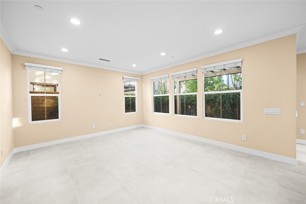 143 Rodeo Irvine, CA 92602 - Photo 7 of 37 a view of an empty room with a window