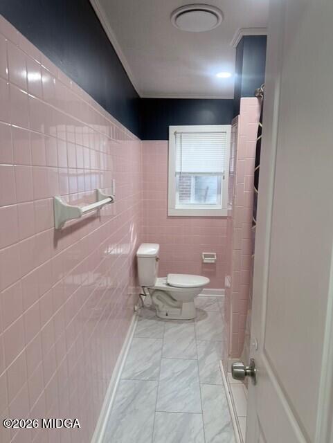 2445 Adams Avenue Macon, GA 31206 - Photo 12 of 30 a bathroom with a toilet and a shower