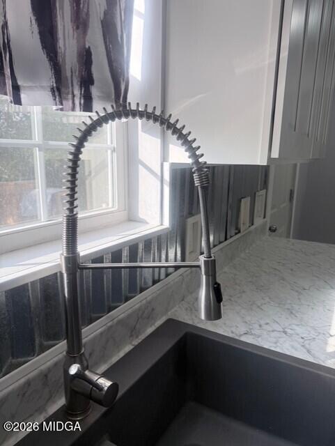 2445 Adams Avenue Macon, GA 31206 - Photo 24 of 30 a kitchen with a sink and window