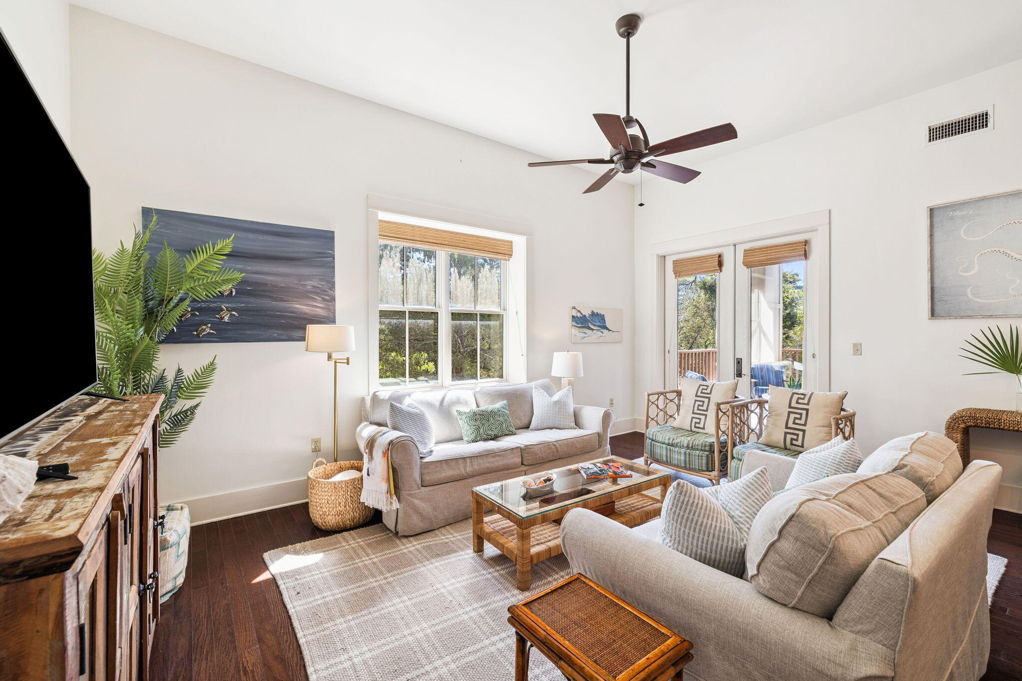 2046 West County Highway 30A, Unit M2230 Santa Rosa Beach, FL 32459 - Photo 11 of 39 a living room with furniture a ceiling fan and a window